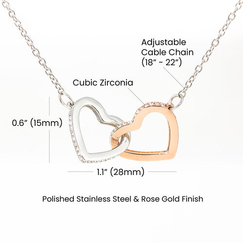 Product diagram of interlocking hearts pendant with dimensions and material specifications.
