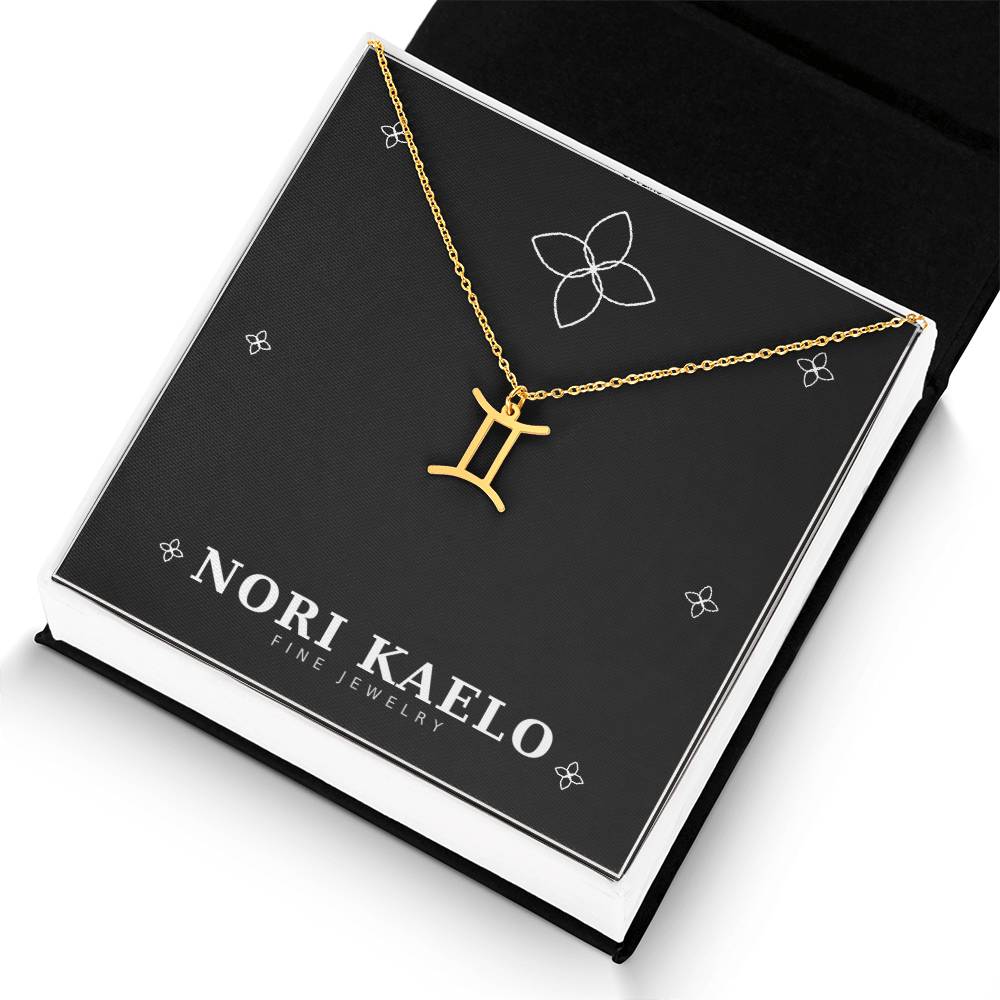 Gold Zodiac Sign Necklace with Gemini pendant, angled view.