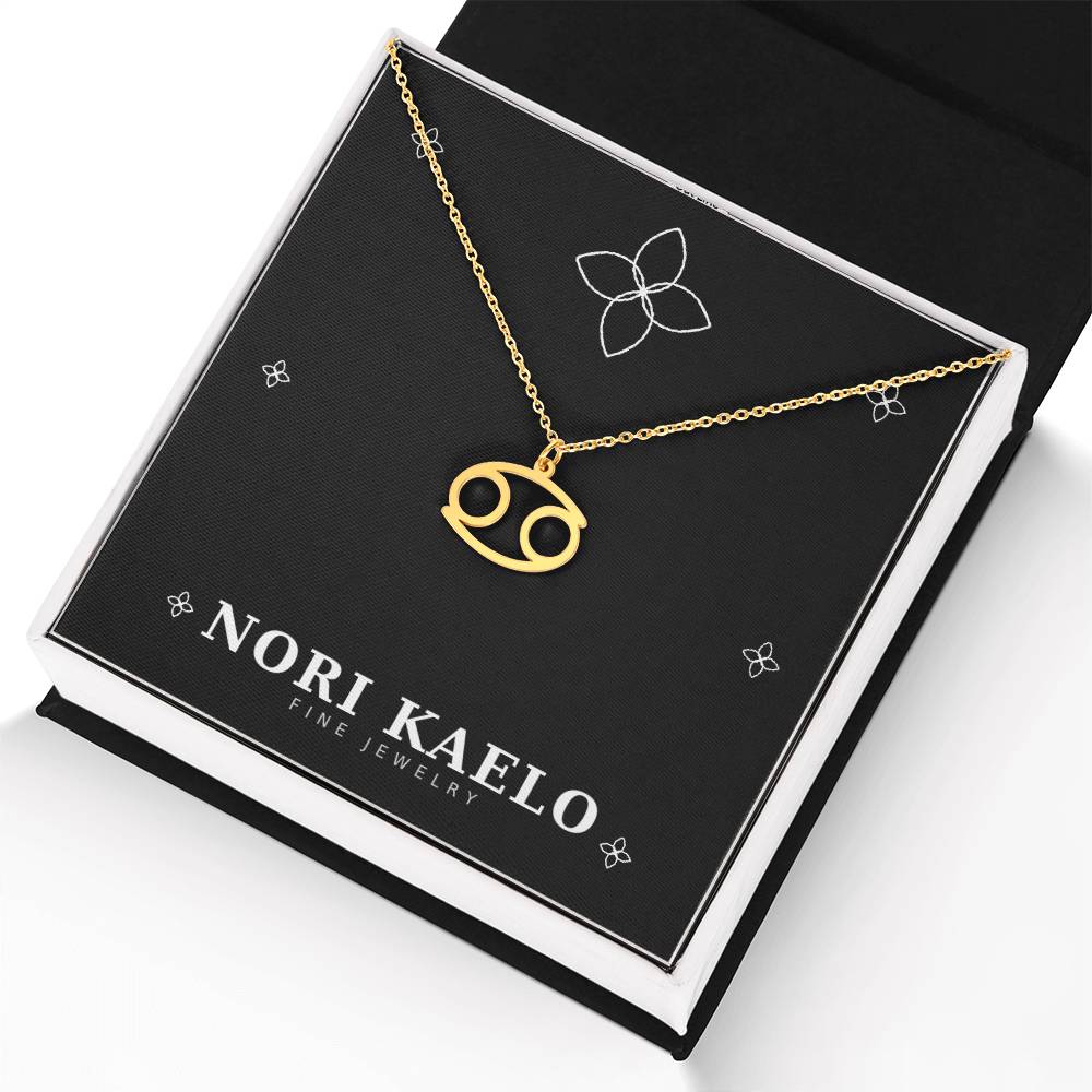 Gold Zodiac Sign Necklace with Cancer pendant, angled view.